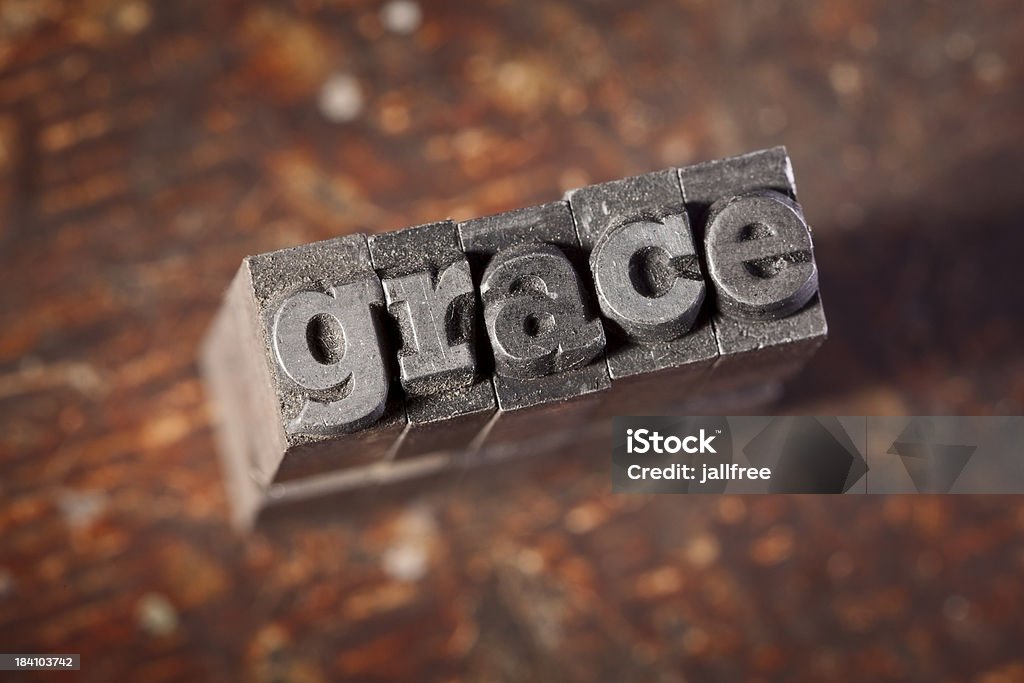 GRACE écrit dans la typographie en métal - Photo de Accord - Concepts libre de droits