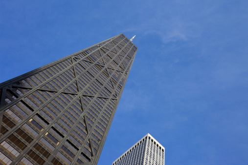 The John Hancock Center reaching towards the sky in Chicago.