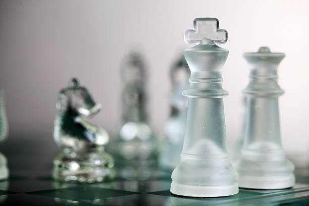 istock Close-up of glass chess pieces. 184104258