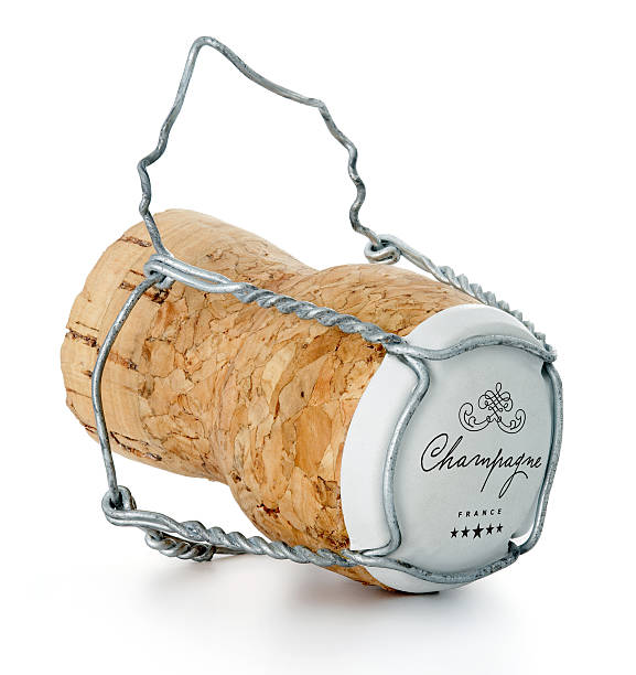 istock One champagne cork on a white background 184105092