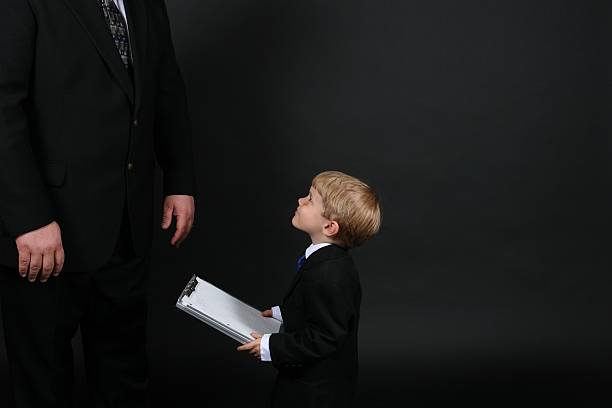 istock Junior Executive - Child in Suit with Clip Board 184105489