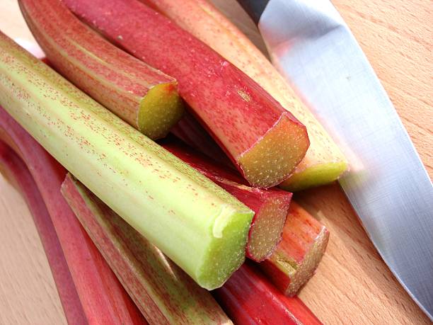 istock Rhubarb on chopping board with knife 184105490