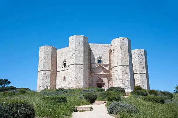 The famous 13th century Castel del Monte (Castle of the Mount) in Apulia, Italy. World Heritage Site since 1996.  Masterpiece of medieval military architecture.