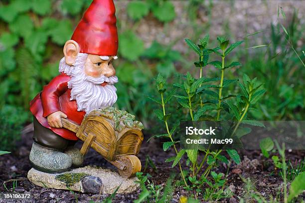 Garden Gnome Working Stock Photo - Download Image Now - Gnome, Wheelbarrow, Garden Gnome