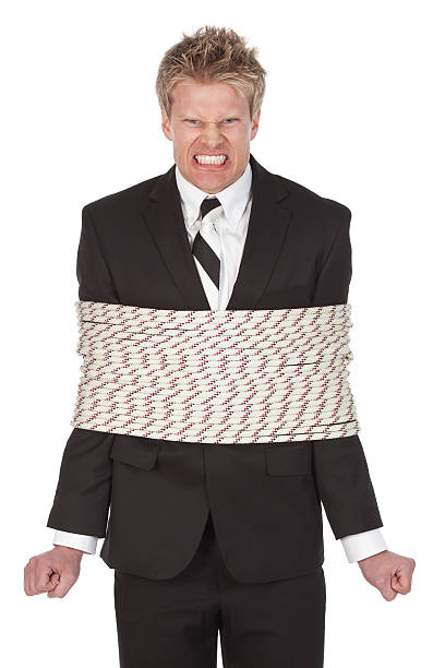 istock Businessman tied with a rope 184106534