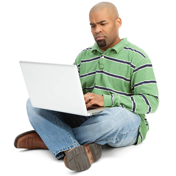 istock African American Man with Laptop 184106665