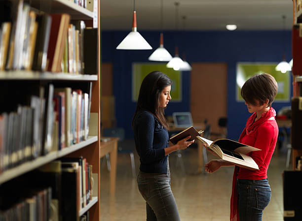 istock College girls in the library 184106820