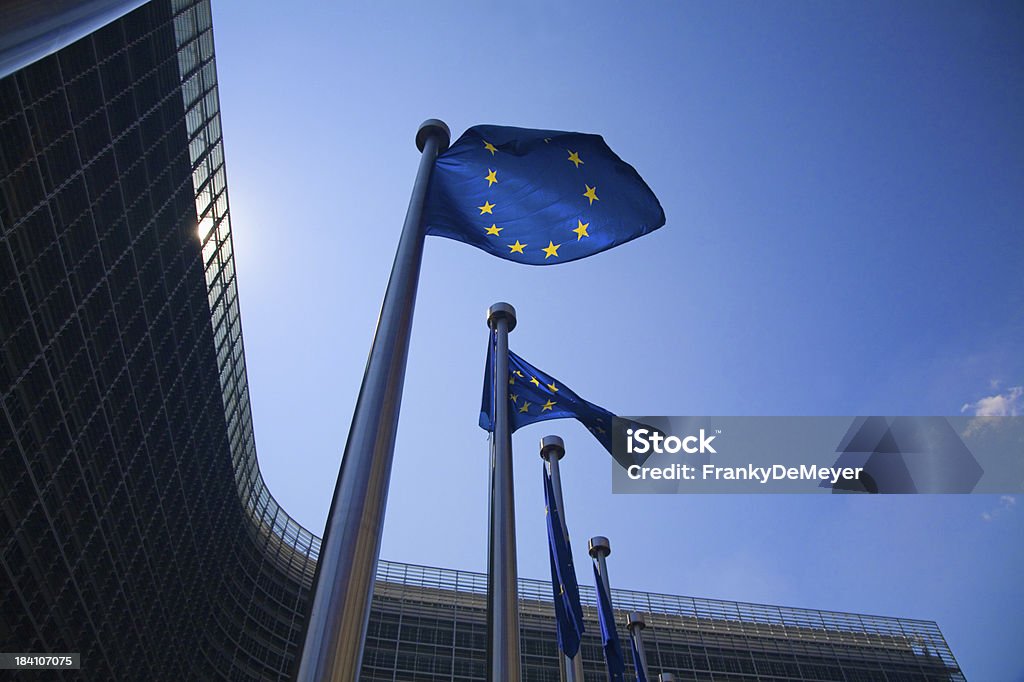 European flags in Brussels Series of European flags in front of the Berlaymont building in Brussels: the European Commission. European Commission Stock Photo