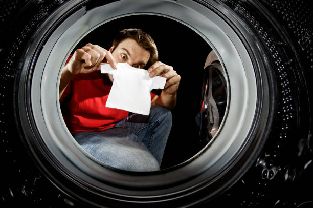 washingday a houseman fail washing his t-shirt contracting stock pictures, royalty-free photos & images