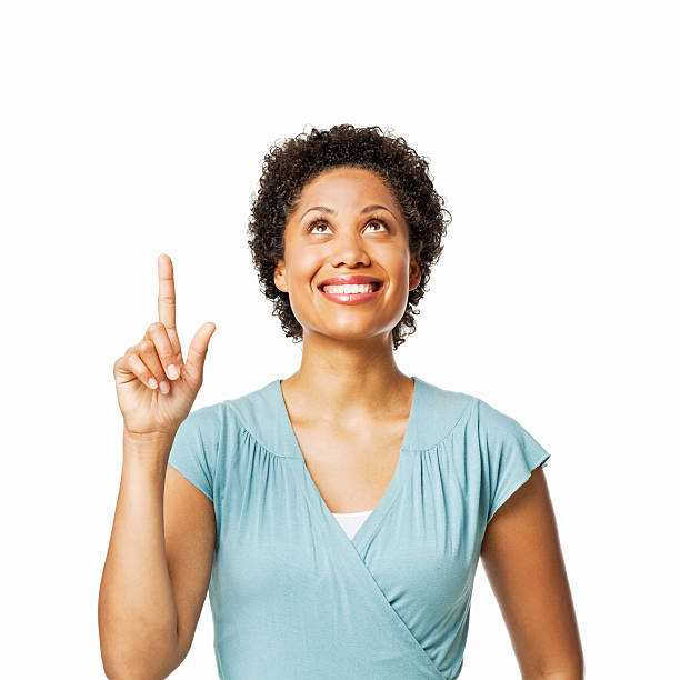 istock Attractive Woman Pointing Upwards - Isolated 184107421