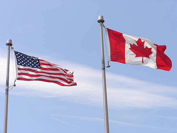 istock American and Canadian Flags 184107565