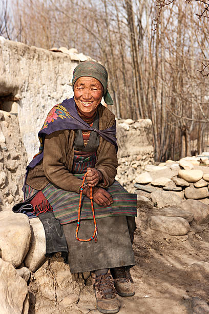 istock Tibetan woman with rosary 184107915