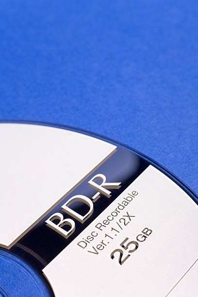Blu-ray Disc Detail Macro shot of a Recordable Blu-ray Disc (BD-R) with a capacity of 25GB. blu ray disc stock pictures, royalty-free photos & images