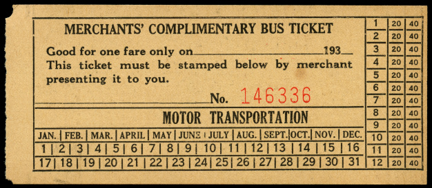 vintage merchants bus ticket on black. Names removed