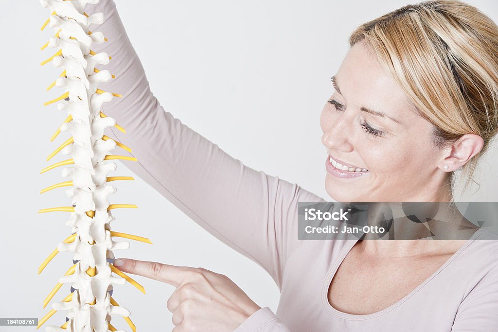 Frau mit Wirbelsäule Physiotherapeuten - Lizenzfrei Arthrosen Stock-Foto