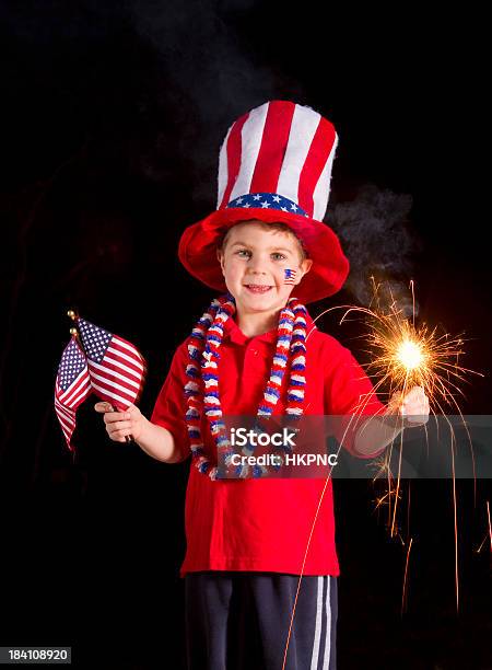 Patriotic Boy Holding Fourth Of July Sparkler Flags Stock Photo - Download Image Now
