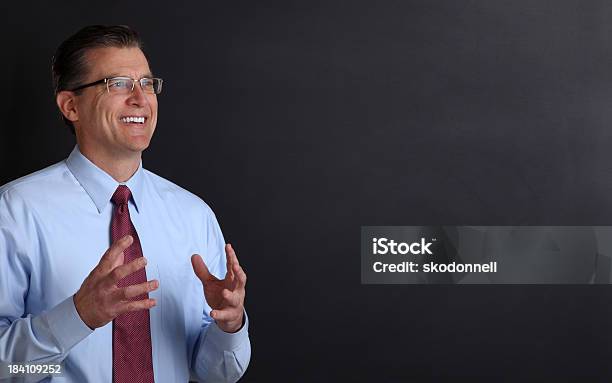 College Professor Against A Chalk Board Stock Photo - Download Image Now - 1950-1959, 50-59 Years, Adult