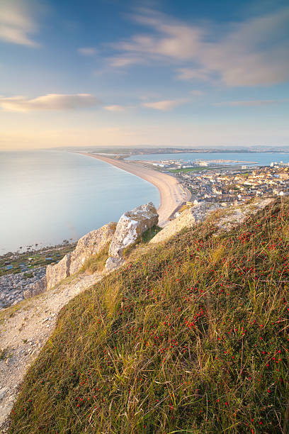 Chesil Beach form Portland. "The view over Chesil Beach from Portland, Dorset, U.K" bill of portland stock pictures, royalty-free photos & images