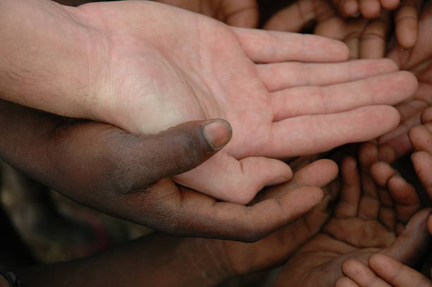 istock Adult & Child Hands 184109712
