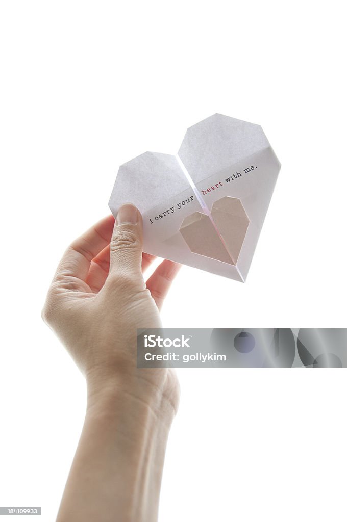 Frau Hand holding origami-Herz - Lizenzfrei Ausgebleicht Stock-Foto
