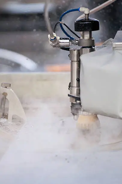 Automated waterjet metal cutting machine in action