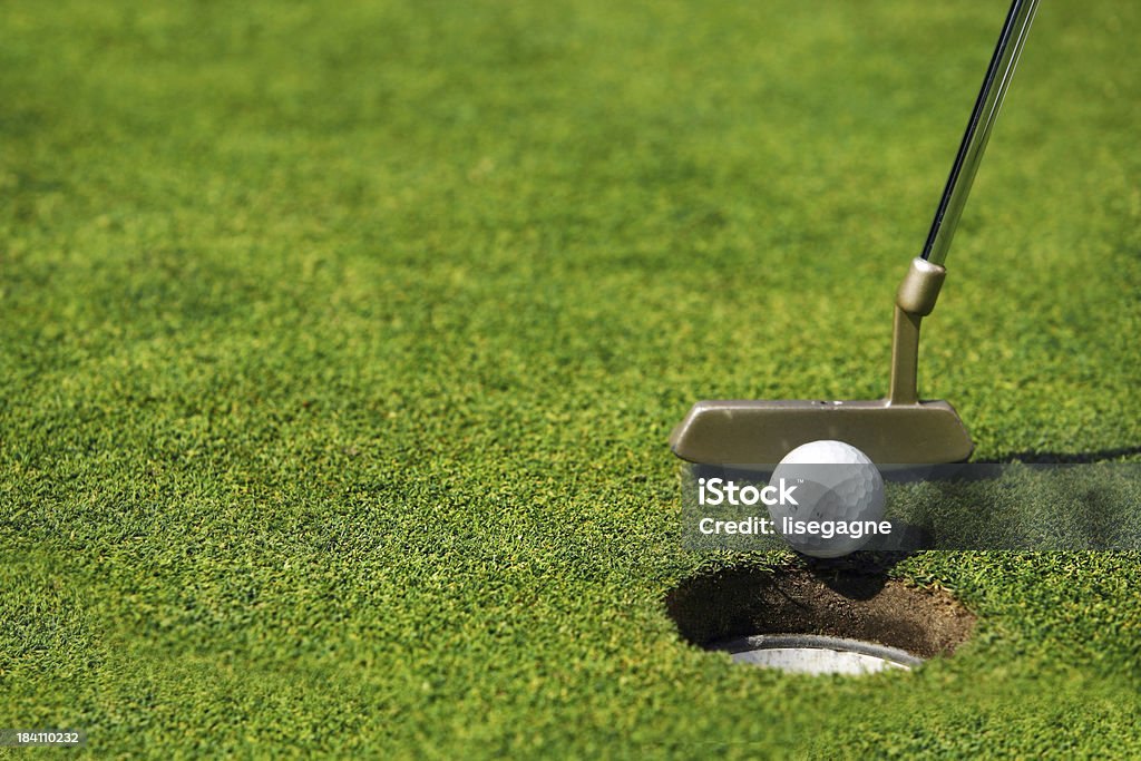 Indoor-Golfanlage "Putter und ball - Lizenzfrei Ausrüstung und Geräte Stock-Foto