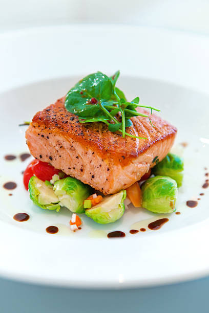 istock Grilled salmon on a bed of vegetables 184110323