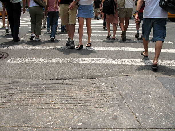 istock People crossing the street 184110375