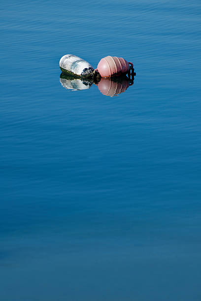 mar e mate - buoy anchored sea wave - fotografias e filmes do acervo