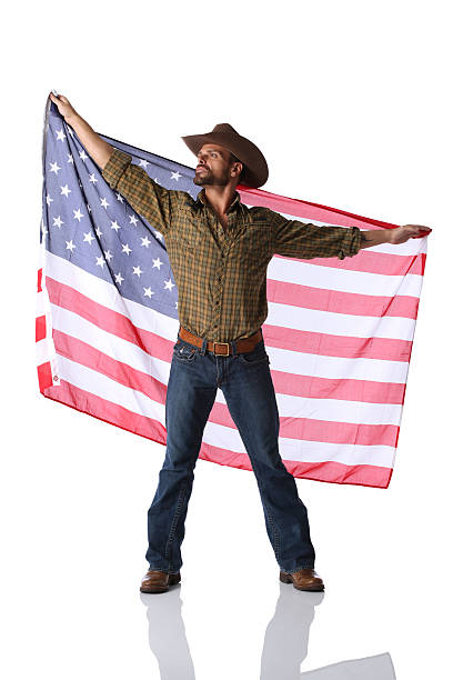istock Cowboy with American flag 184110735