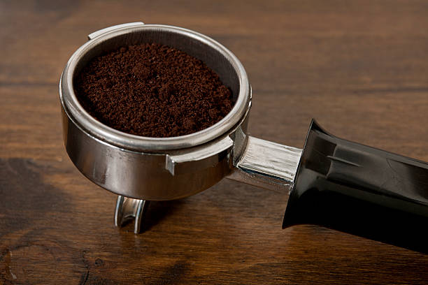 istock PORTAFILTER filled with fresh ground coffee 184110805