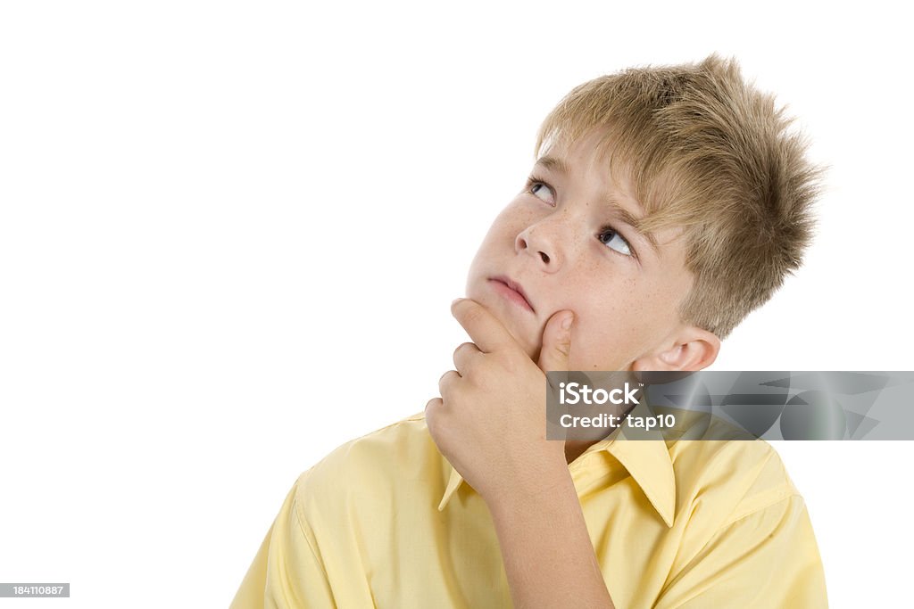 Thinking Child A boy thinking on white. Beautiful People Stock Photo