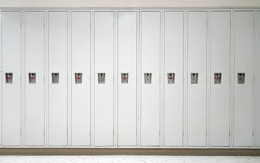 close up on white lockers in the school