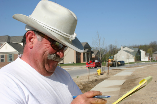 Hispanic construction worker in cowboy hat and sunglassesSimilar images: