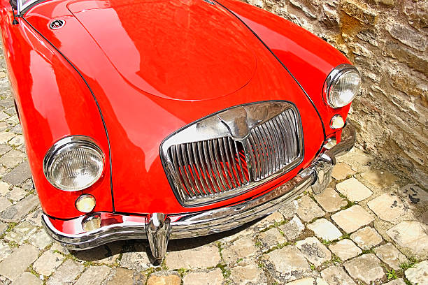 istock Flaming red british vintage car 184111868
