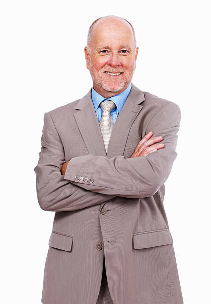 istock Senior business man standing with arms crossed 184112042