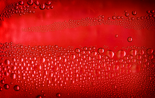 water drops inside a bottle product of some condensation effect, the red tone gave the idea of blood cells