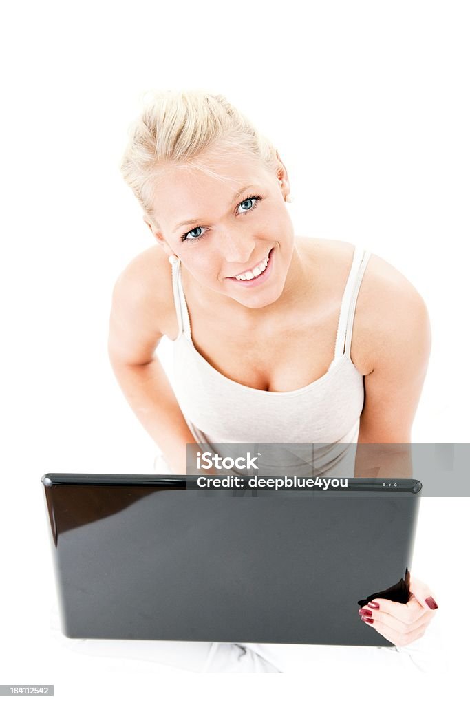 Attraktiv adolescente blonde tenant un ordinateur portable - Photo de Adolescent libre de droits