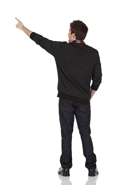 istock Rear view of a man pointing with finger 184113003