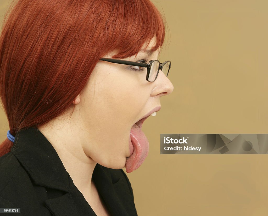 Tongue Woman sticking out her tongue Eyeglasses Stock Photo