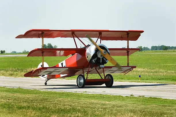 Triple Winged German WW I Fokker Taxis to active runway