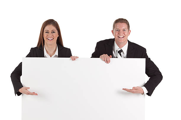 istock Business executives with a placard 184114327