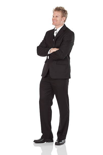 istock Businessman standing with arms crossed 184114645