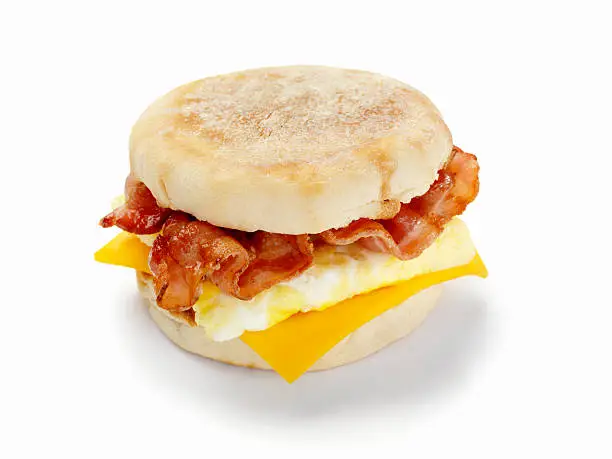 Bacon, Egg and Cheese Breakfast Sandwich on a Toasted English Muffin with a Natural Drop Shadow- Photographed on Hasselblad H3D2-39mb Camera