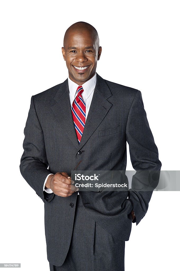 African American Businessman Confident smiling African American Businessman in a suit holding glasses. Take a look at some of the other images from the series. Men Stock Photo
