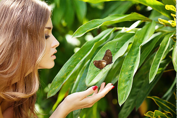 istock Beautiful woman and butterfly 184115336