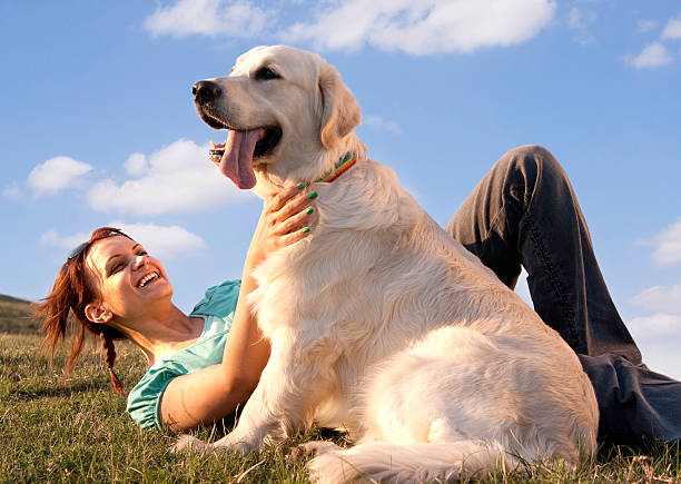 istock Young girl with a dog 184115539