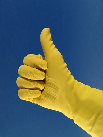 Yellow rubber glove with thumbs ahoy