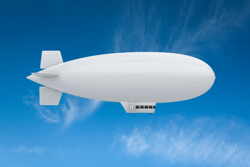 Large blimp with copy space for your message.Could be a great image to announce a big sales promotion.This is a detailed 3d rendering.