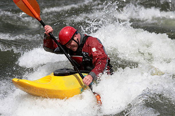 istock Whitewater Kayker Paddling Hard 184115953
